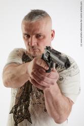 Yury Fighting Pose With Gun